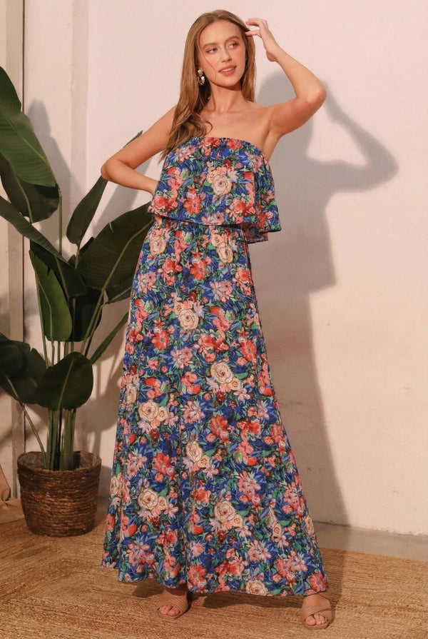 Strapless maxi dress with blue floral print and ruffled bodice