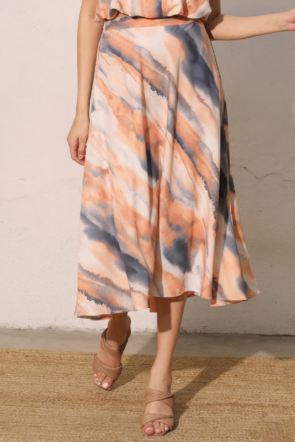 Tie-dye midi swing skirt in peach and dark blue, flared hem from waist